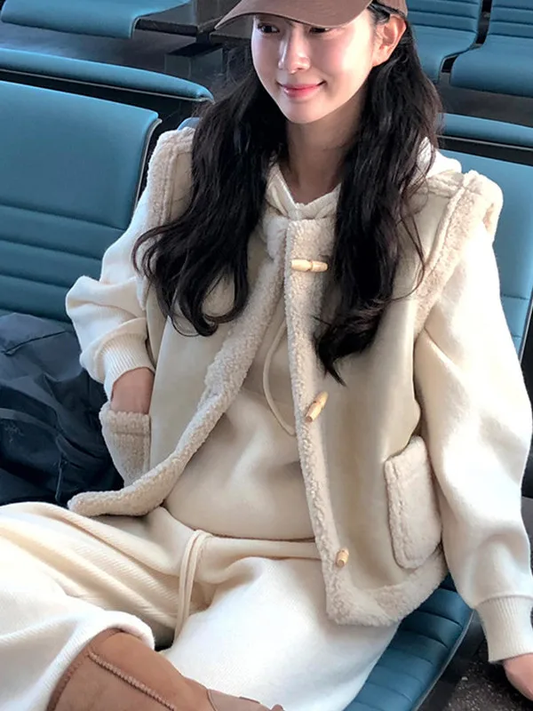 Chic hiver nouveau Sle femmes en cuir fourrure intercé gilet manteau avec bouton conception Faionable Anti-âge à la mode