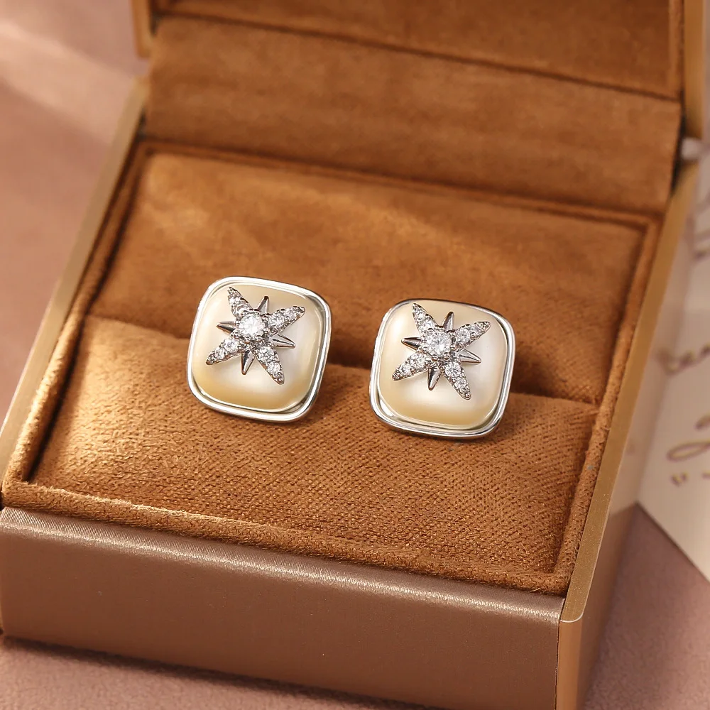 Fashionable and exquisite pearl earrings, high-end micro-paved zircon eight-pointed star earrings, elegant and versatile earring