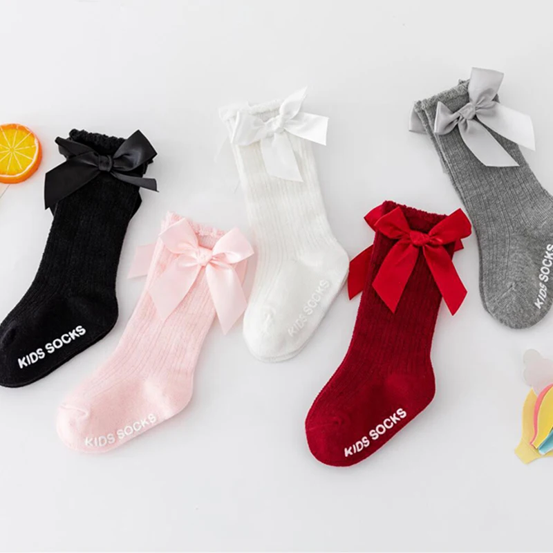 

Детские длинные носки с бантом, весенне-осенние детские вязаные чулки, нескользящие гольфы принцессы для девочек, однотонная хлопковая обувь для новорожденных, От 0 до 3 лет