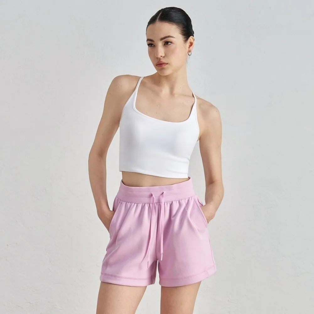 Damska sportowa koszulka bez rękawów, top na ramiączkach, odkryte ramiona, jednolity kolor, krótka, dopasowana koszulka do jogi, krótki top typu tank top.