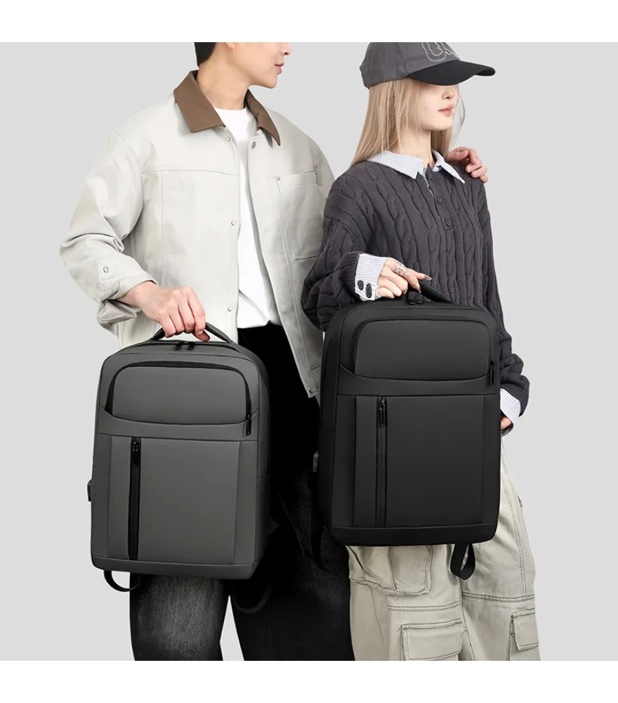 

Dark gray office backpack with dual front zipper pockets hidden anti theft pocket padded top handle scratch resistant fabric