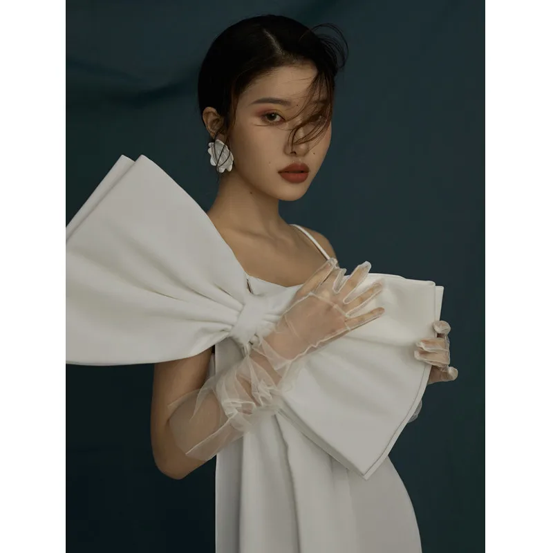 Light Wedding Dress Bride's Tail Thin Shoulder Strap Exposed Back Simple Korean White Slimming Bow Party Dress Customized