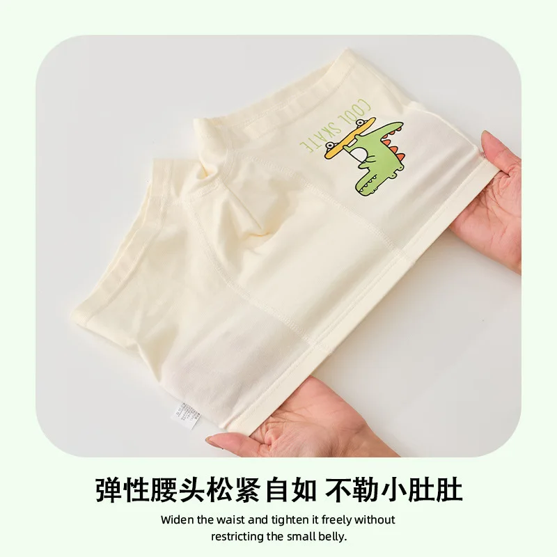 Lindo patrón de dinosaurio de dibujos animados para niños tamaño mediano y grande 95% algodón Clase A algodón calzoncillos tipo bóxer cómodos y transpirables