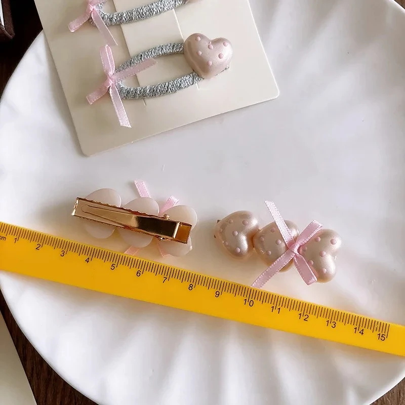 

2025 Hot Sale Japanese Style Light Pink Bowknot Pearl Heart Dots Child Hairpins Sweet Girlish Versatile Hair Clips Elastic