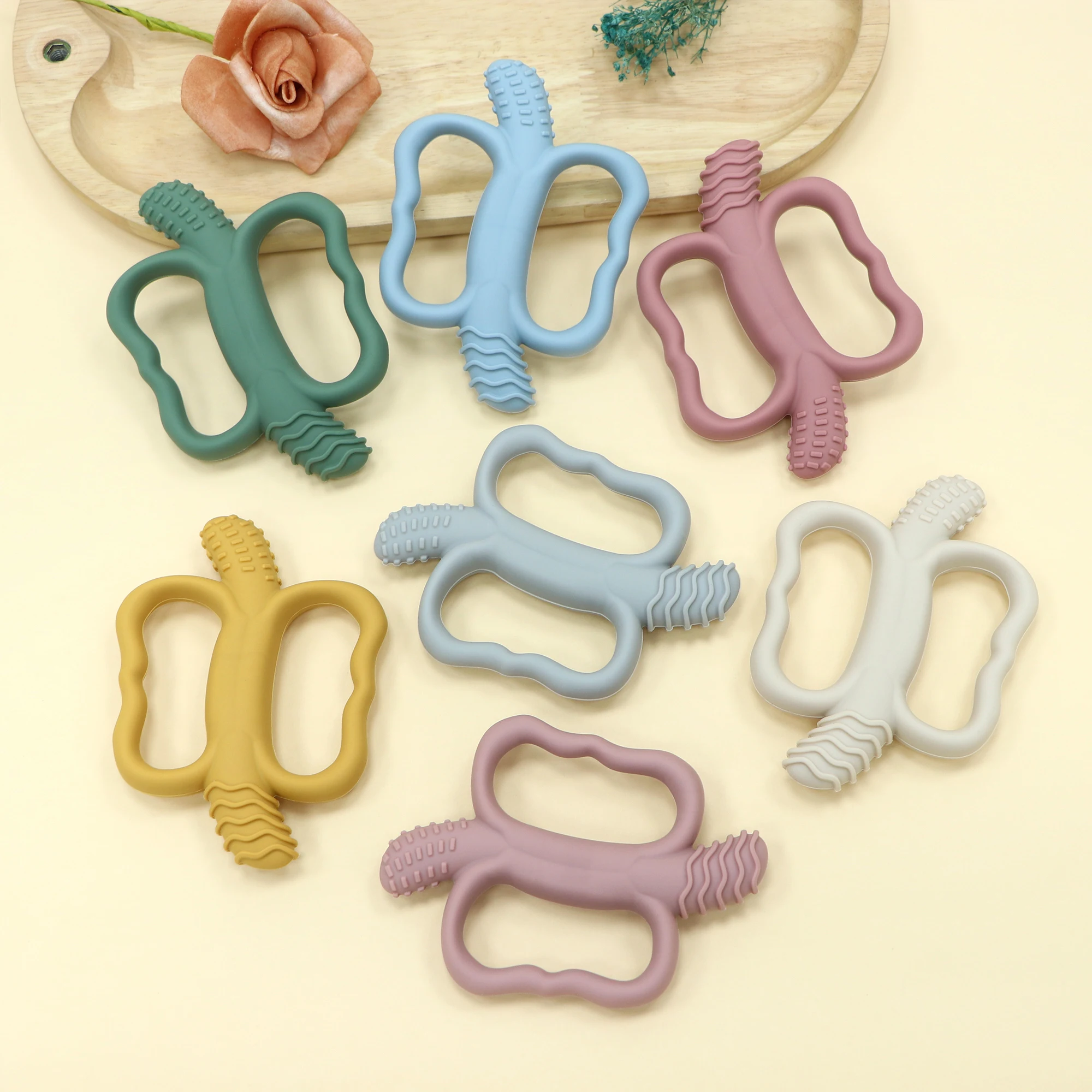 ของเล่นกัดฟันรูปกล้วย ทำจากซิลิโคนเกรดอาหาร ออกแบบมาโดยเฉพาะสำหรับเด็กที่กำลังงอกฟัน จับง่าย