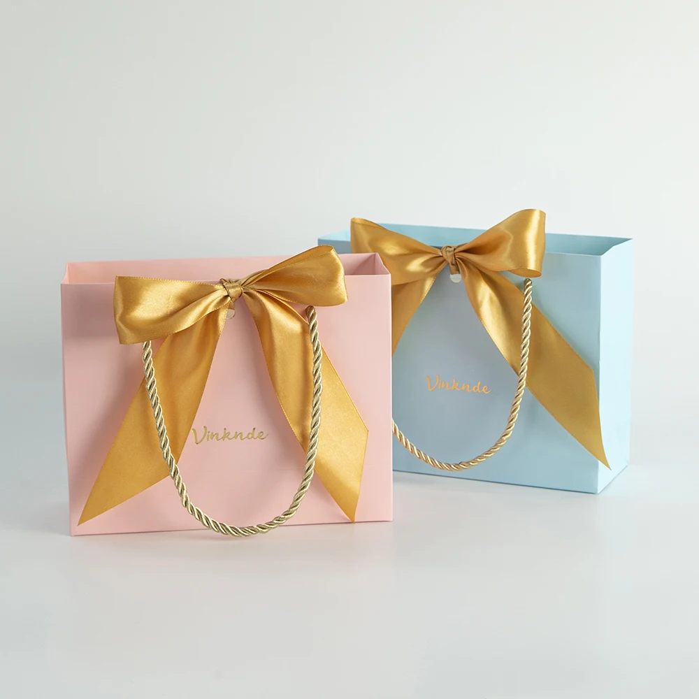 50Pcs Bulk Paper Handle Bag with Gold Bow Jewelry Dust Proof Pouch Wedding Birthday Christmas Candy Gift Organizer Custom Logo