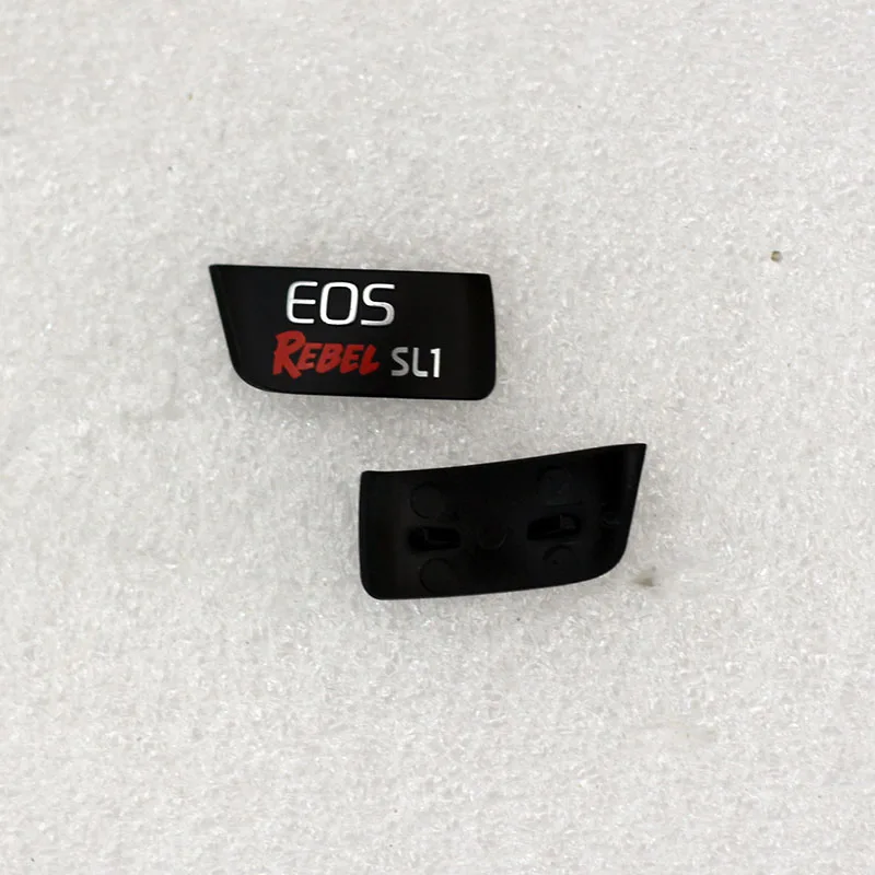 جديد الأصلي شعار الجسم شعار لوحة اسم جزء إصلاح لكانون EOS المتمردين SL1 SLR