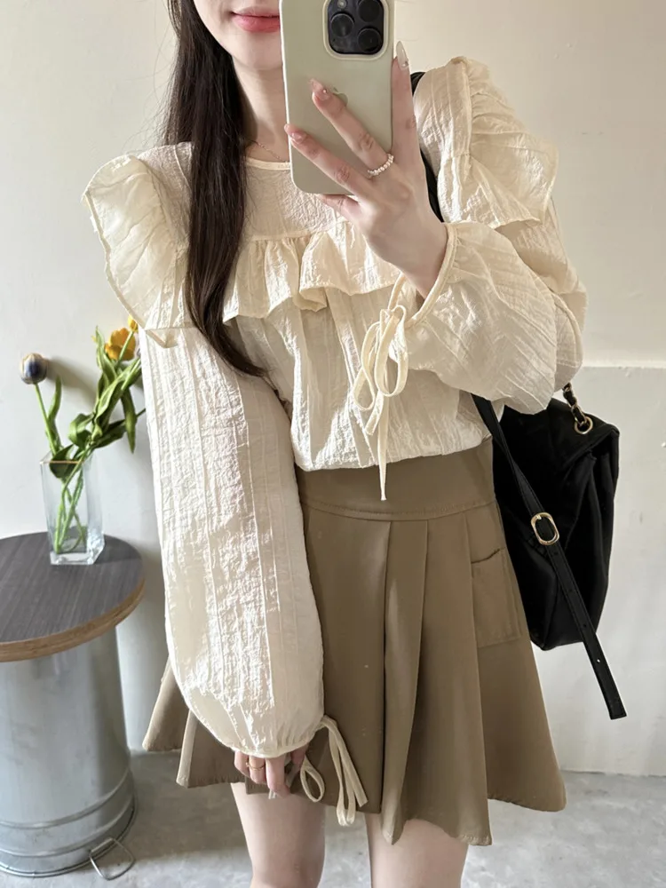 

Korean Long Sleeve Wrinkle Blouses Women Ruffle Lace Up White Shirt Sweet Temperament Straight Loose Tops Spring Summer 2023