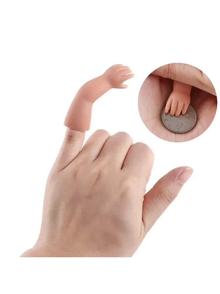 Tours de magie amusants pour bras de bébé, 1 pièce, la petite farce à la main, accessoires magiques, pièces de monnaie qui disparaissent, magiciens de Performance en gros plan