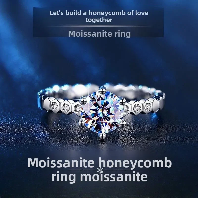 

Honeycomb Collection Ring: Features a 1CT D Color Moissanite & Unique Hexagonal Structure in S925 Silver. Fine Craftsmanship