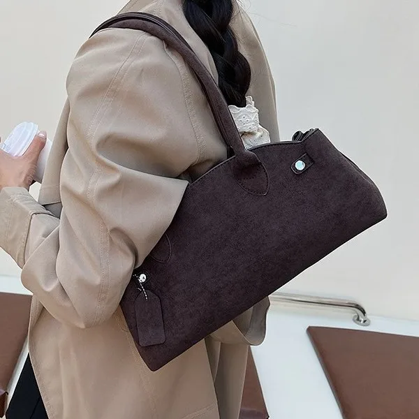 

Женская винтажная замшевая сумка на осень-зиму 2026, новая модная нишевая модель, универсальная сумка-мессенджер