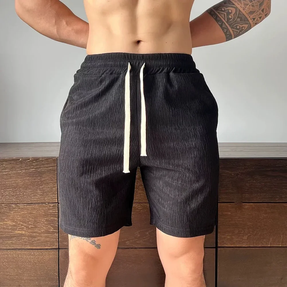 

Mens Summer Solid Color Cool Loose Fit Shorts Fashion Sports Five Point Pants