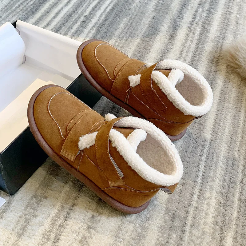 أحذية الثلوج الدافئة سميكة سوليد جلد الغنم للنساء2025New الشتاء نمط الانزلاق على أحذية قطنية سميكة المضادة للانزلاق