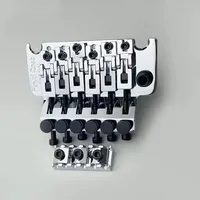 Q-X-Cloja de música-nuevo-1Set Original y genuino sistema de trémolo especial puente accesorios de guitarra con tuerca de bloqueo de 42MM/43MM