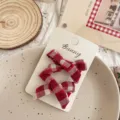 Checked Cross Knot
