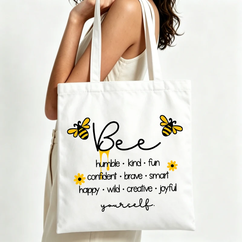 Women's bee and flower graphic canvas tote bag with handwritten text, casual style for daily shopping and outings