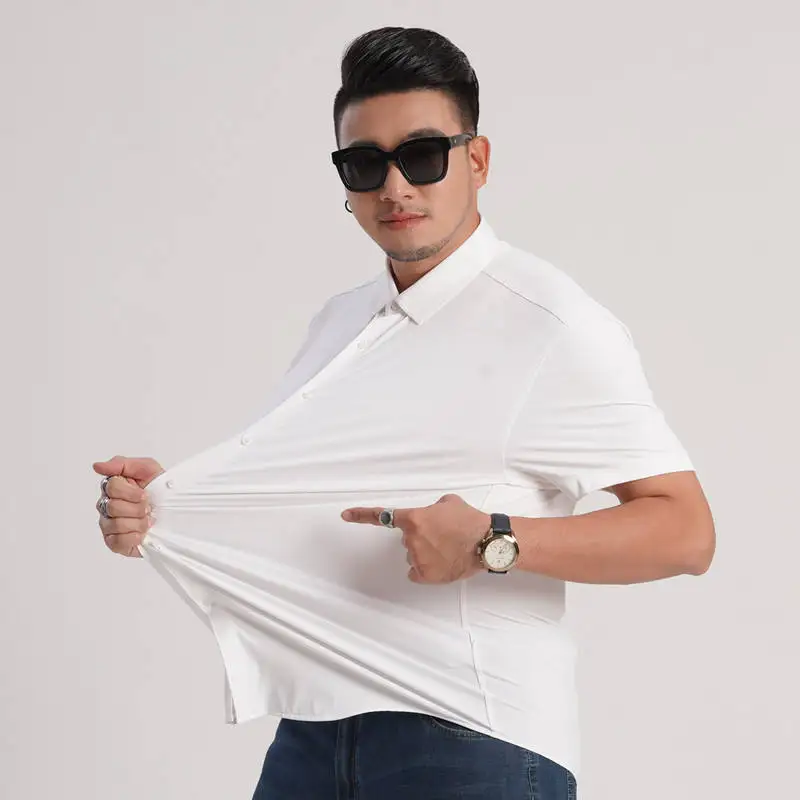 

Men's Summer Thin Elastic Seamless Short Sleeve Shirt plus Size Big Brother Large Code Pure Color Dress Shirt PU Leather Dail...