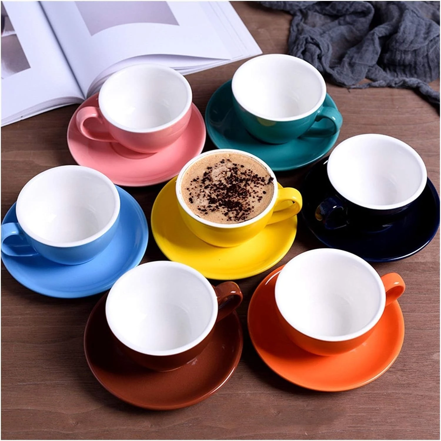 morning coffee or afternoon tea. This set includes six beautifully crafted ceramic cups, saucers, and mugs in a sleek and modern