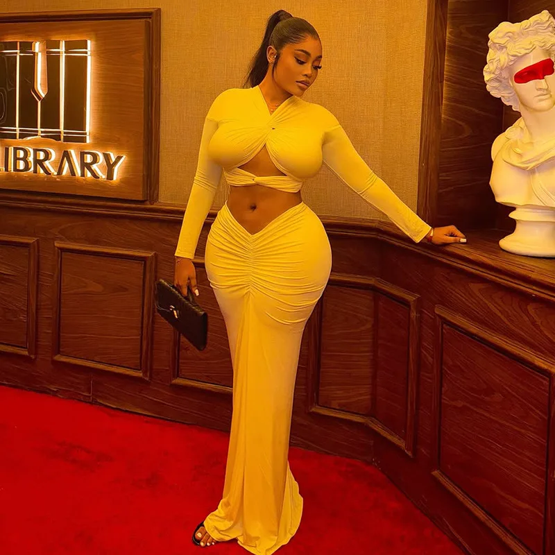 

Женский комплект с темпераментом обнимания бедер, плиссированной индивидуальностью, выдалбливают, открытый пупок, однотонный цвет, комплект из двух предметов с v-образным вырезом