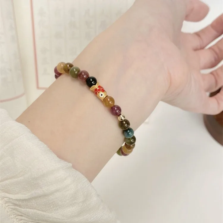 

Like a fish in water, rainbow tourmaline bracelet, niche koi bracelet