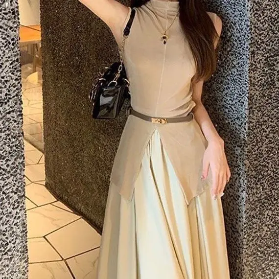 Two-piece women\'s summer new temperament design sense irregular waist fashion temperament Joker elastic waist skirt