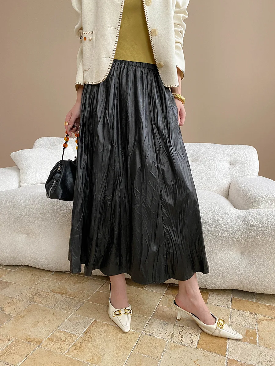 Early autumn new light luxury texture pleated PU leather elastic waist A-line leather skirt half skirt