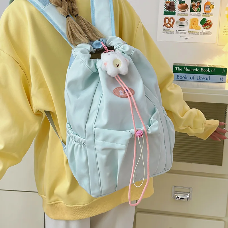 Drawstring Backpack with Cute Plush Pendant Ruffle Pocket Large Capacity Casual School Bag for Teen Girls Daily Use