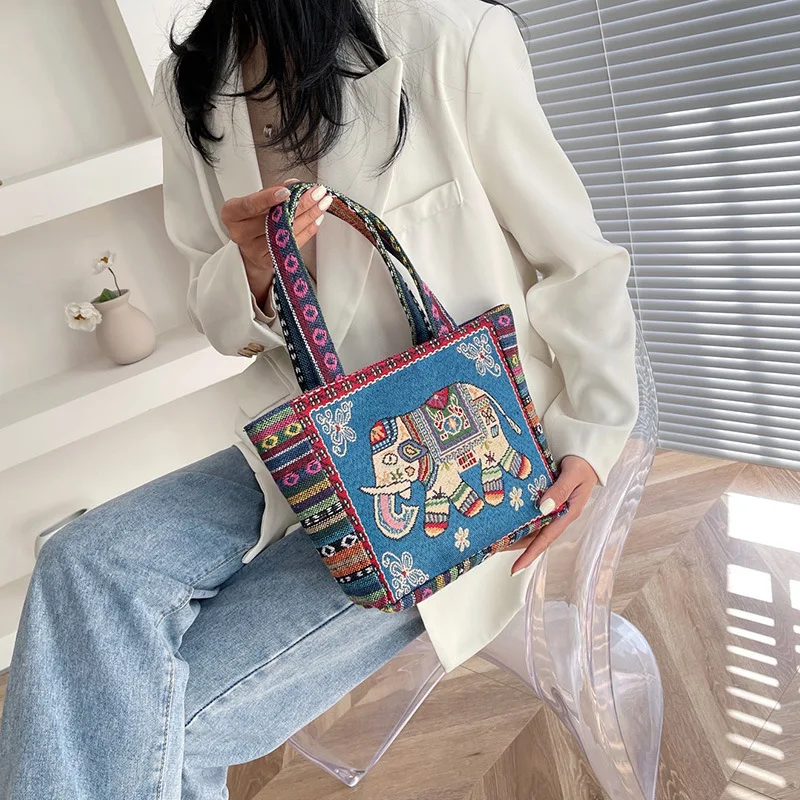 

Women's Canvas Handbag Ethnic Style with Elephant Embroidery Suitable for Work Leisure Outings Small Tote Bag