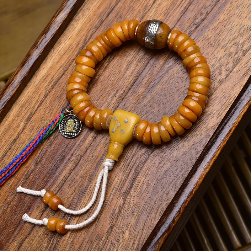 Tibetan return yak bone sausage beads to play with strings single-ring copper card material ware carving Buddha's hand hand-held
