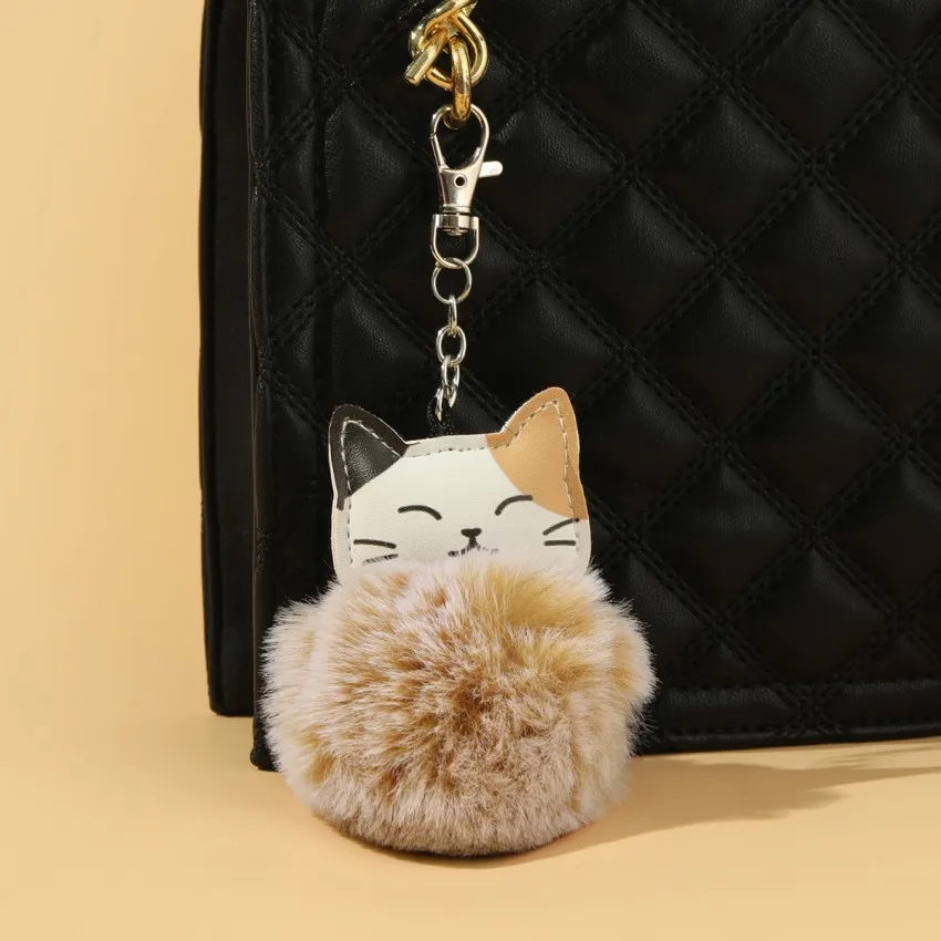 New Cute Plush Cat Hairball Keychain Simple and Versatile Leather Lucky Cat Car Bag Pendant Gift Wholesale