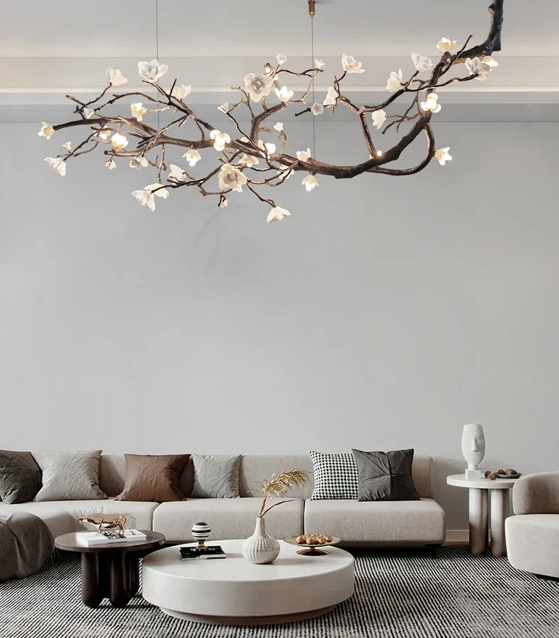 Lampe suspendue en forme de branche d'arbre en céramique et cuivre de style nordique, adaptée à l'éclairage des salons et des restaurants d'hôtel. Corps noir.