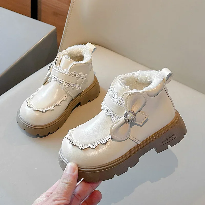 Stivali da principessa per ragazze Scarpe invernali con fiocco dolce per bambini Caldi stivali corti in cotone moda per bambini Chic bordo arricciato Versatile