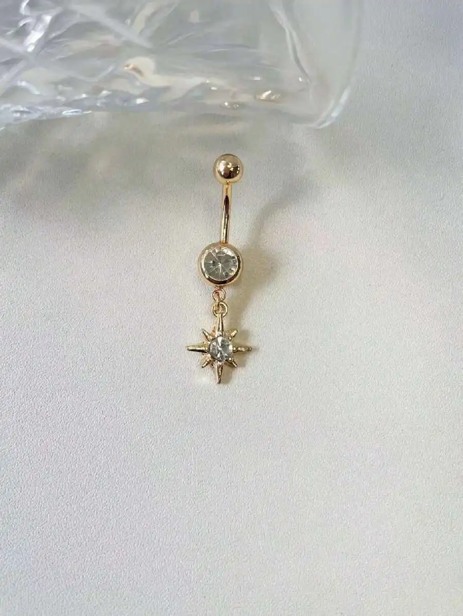 

Gold Stainless Steel Navel Piercing With Clear Rhinestone Eight-Point Star Dangle, Ideal For Festival, Beach, Club, And