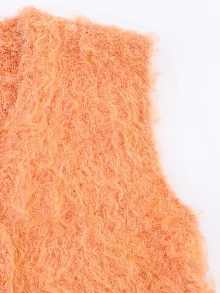 Nuovo gilet alla moda da donna in stile europeo, versatile ed elegante, cardigan lavorato a maglia dai capelli lunghi in tinta unita.