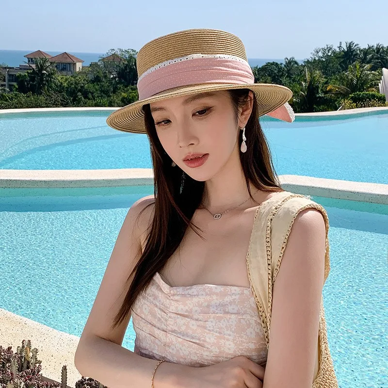 A new style of women's hat with ribbon flat top seaside woven sunshade