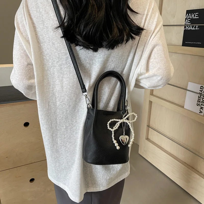 Simples moda high-end cor sólida bolsa do plutônio para as mulheres novo simples balde saco elegante ombro único crossbody saco