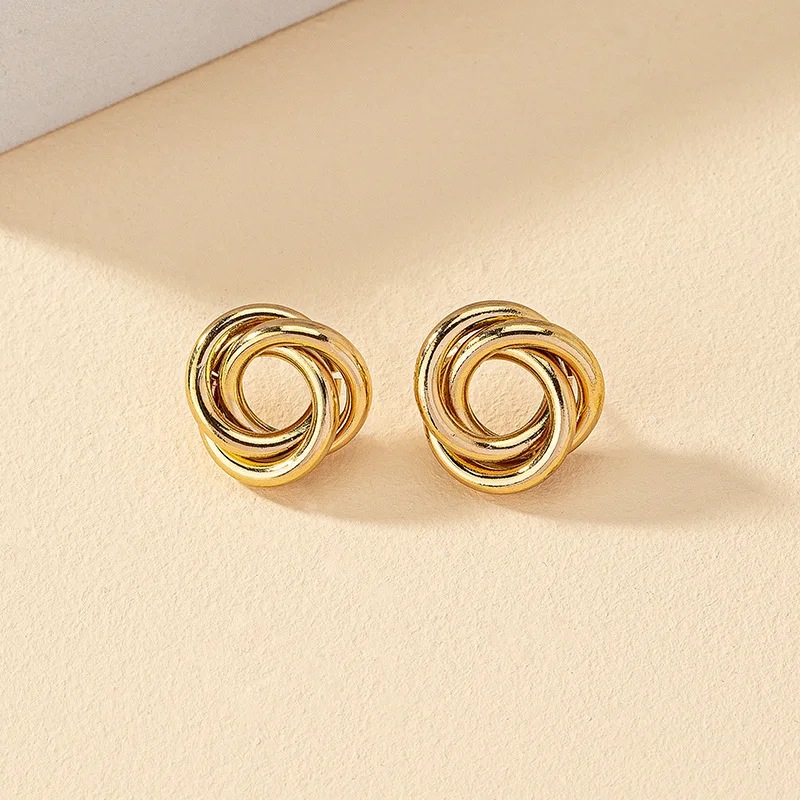 

Small Twisted Stud Earrings for Women Gold Color Rock Simple Glossy Geometry Metal Knot Earring Party Jewelry Girl Gift