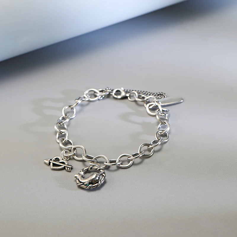 

Genuine 925 sterling silver James Avery Forged Link Charm Bracelet paired with Joyful narwhal and arrow of love pendant