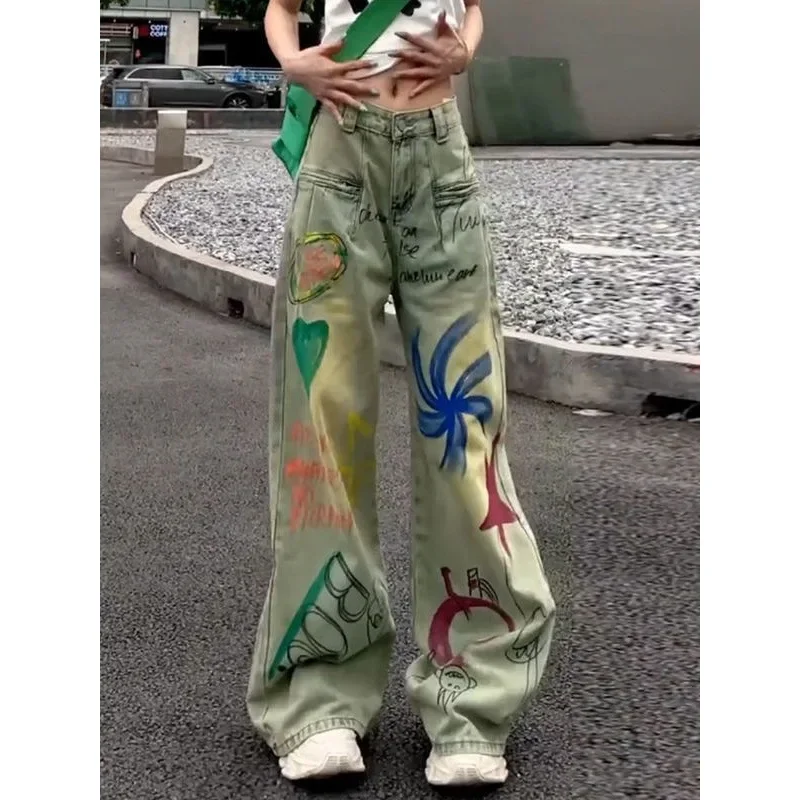 

Graffiti jeans women's autumn 2024 new personalized design sense printed straight loose slim high sense casual wide-leg pants.