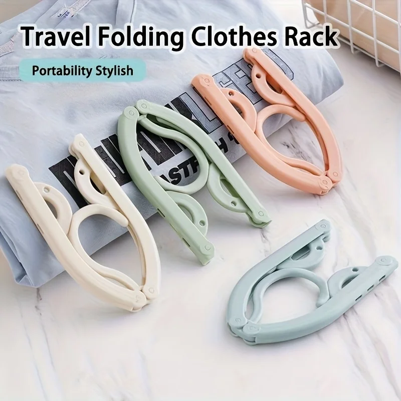 Percha de ropa de viaje plegable portátil: ahorro de espacio, plástico duradero, color aleatorio, ideal para accesorios de crucero