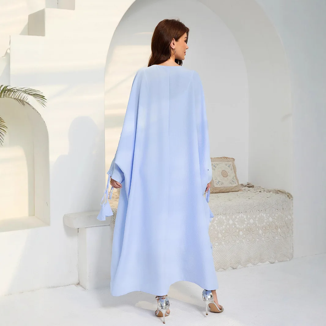 2025 Sud-Est delle nuove donne di modo di colore solido casual alla moda allentato lungo pipistrello manica ad ala Abaya femminile abiti musulmani cardigan