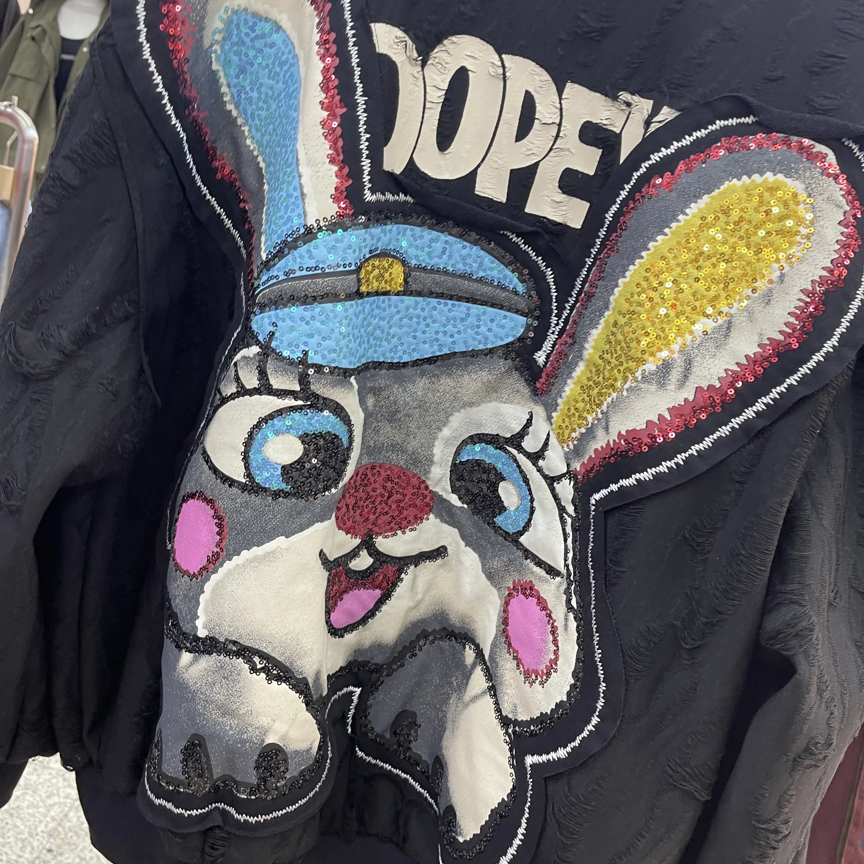 เสื้อแจ็คเก็ตกระต่ายการ์ตูนปักเลื่อมหนัก แบรนด์ทันสมัย สำหรับผู้หญิง ฤดูใบไม้ร่วง 2025 รุ่นใหม่ ทรงหลวม ใส่ได้หลายโอกาส ช่วยลดอายุ พร้อมฮู้ด