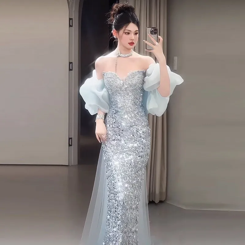 

A new one-shoulder blue fishtail sequined light luxury student graduation dress for toasting