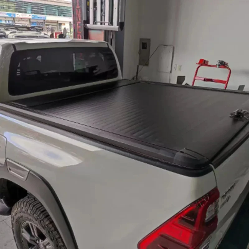 High Quality Navara Ram 1500 Tacoma Tundra Hard Aluminum Alloy Retractable Roller Shutter Tonneau Cover