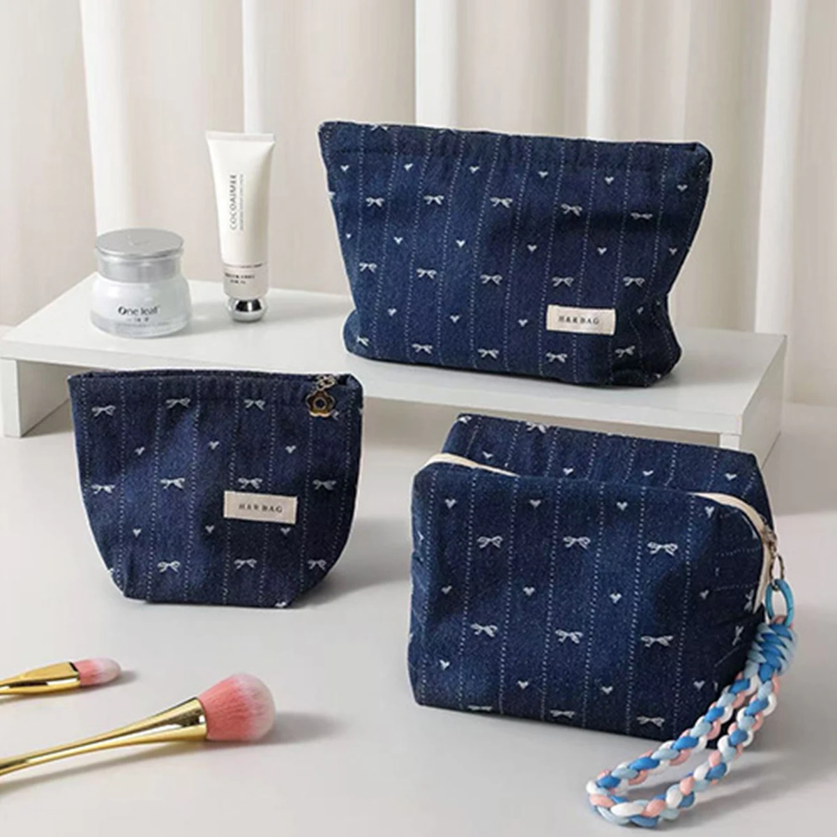 Borsa per il trucco in tessuto per ragazza con fiocco da cowboy retrò in tela Borse portaoggetti portatili per cuscini per la cura della pelle