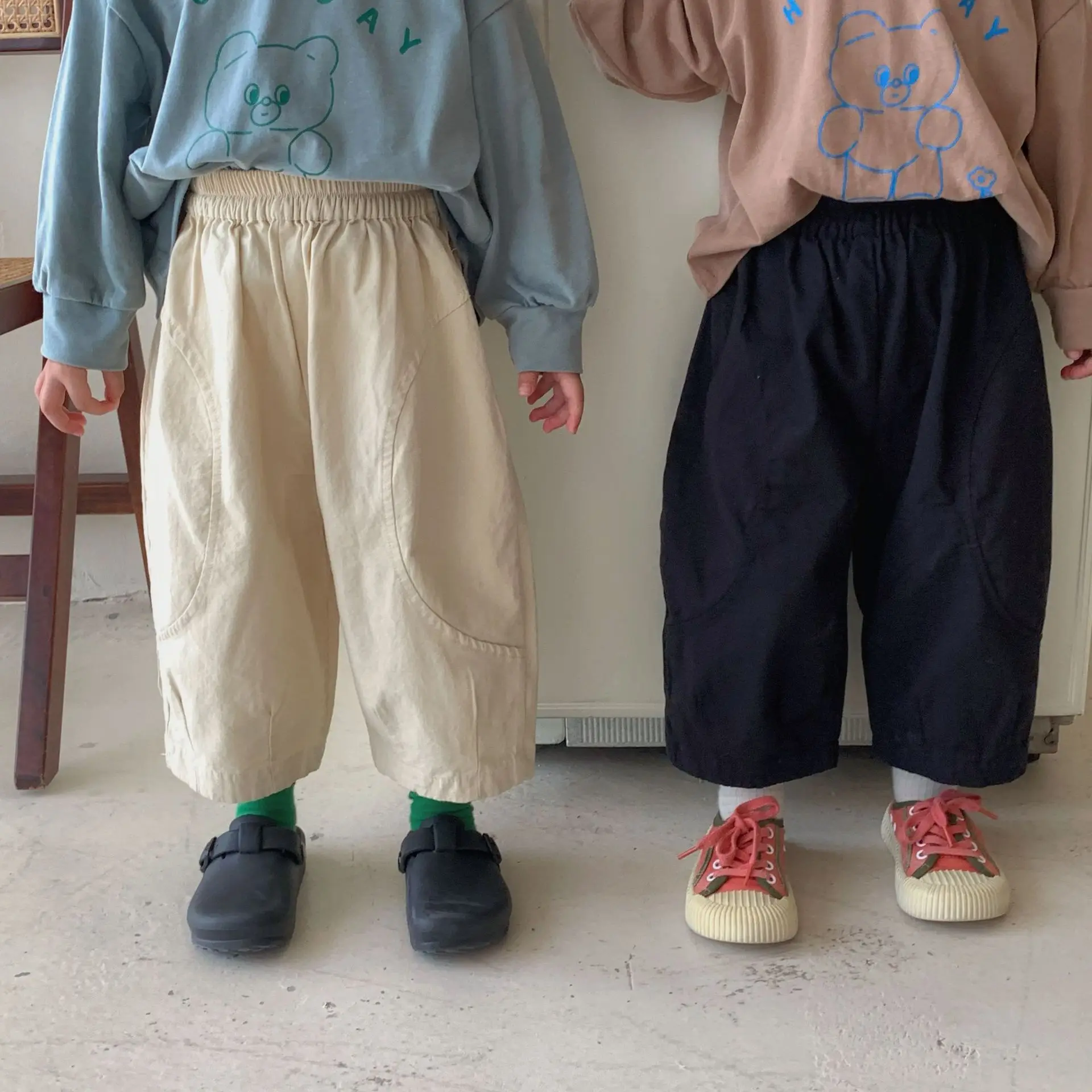 Pantaloni a gamba larga per bambini pantaloni larghi coreani 2024 nuova primavera autunno pantaloni Casual per neonati alla moda per bambini