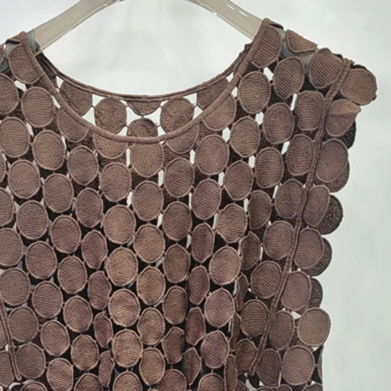 ANJY 2026 primavera nueva moda mujer 2 piezas conjunto diseño único gancho flor encaje hueco Top tendencia Chic Ins Streetwear falda A16972