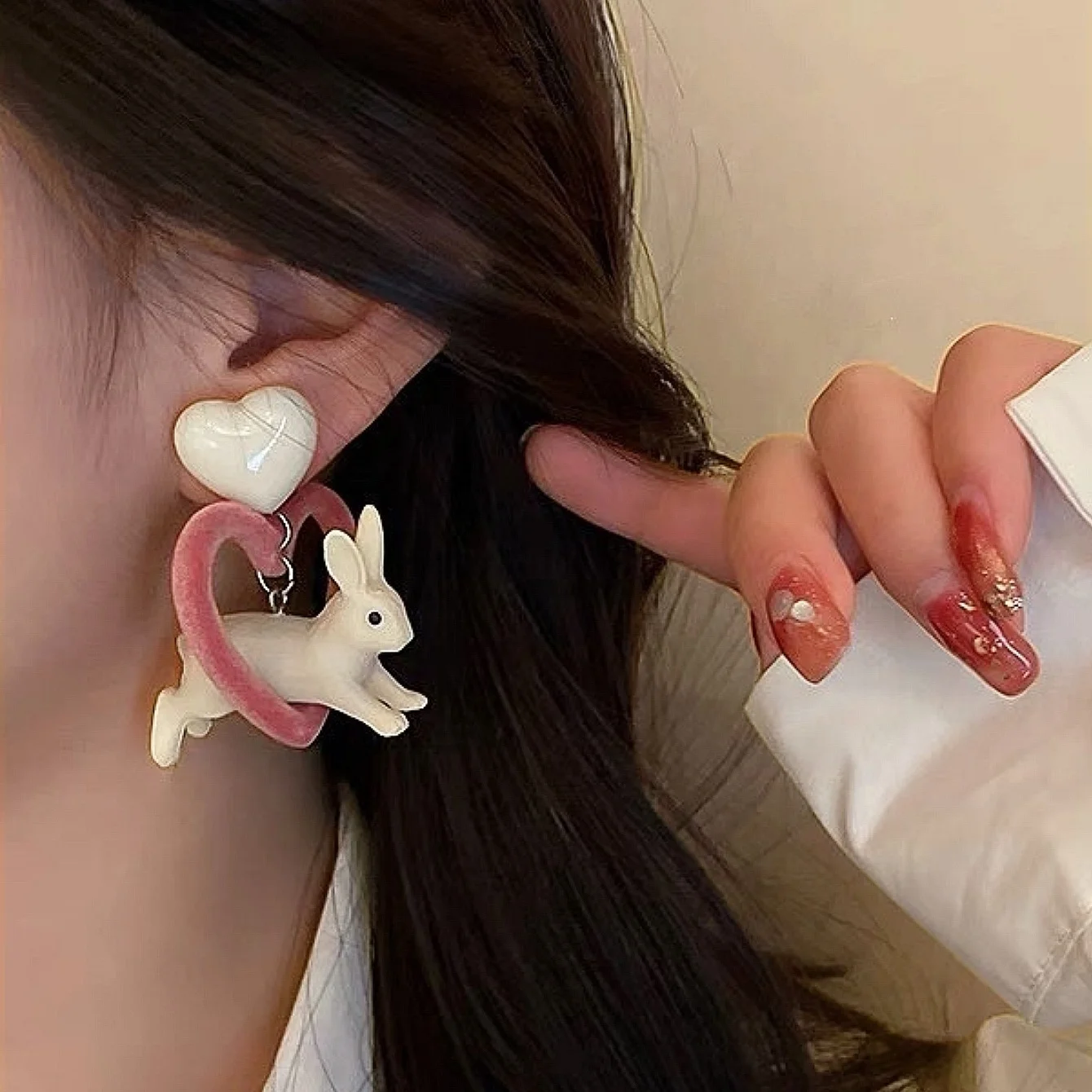 A Pair of Simple Cartoon Cute Sweet Velvet Hollow Love Three-dimensional Rabbit Personality Earrings