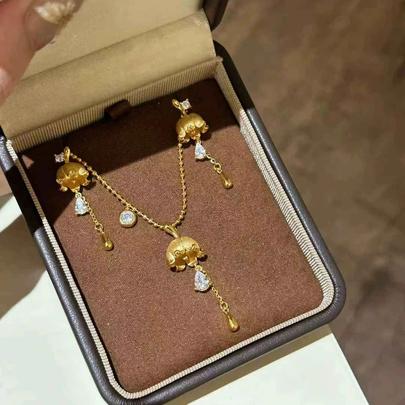 novo-estilo-europeu-ouro-escovado-sino-orquidea-gota-de-agua-colar-brincos-high-end-requintado-flor-borla-conjunto-de-joias-para-mulher