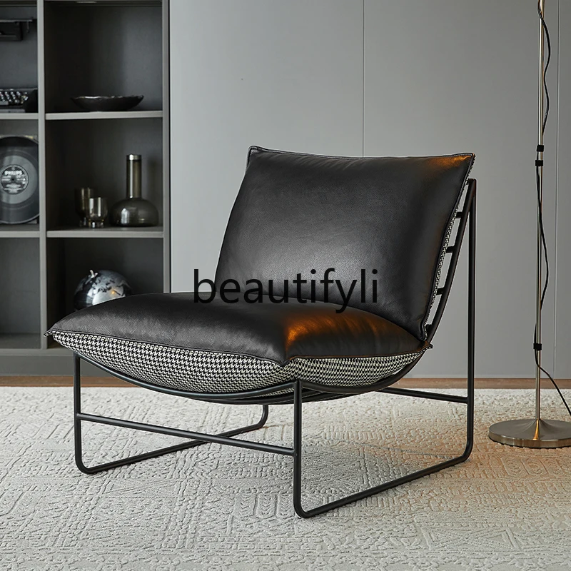 Single sofa chair imported leather leisure Nordic expression light luxury recliner lazy household iron art